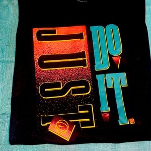 Brand new Nike dri fit short sleeve shirt. Size adult small